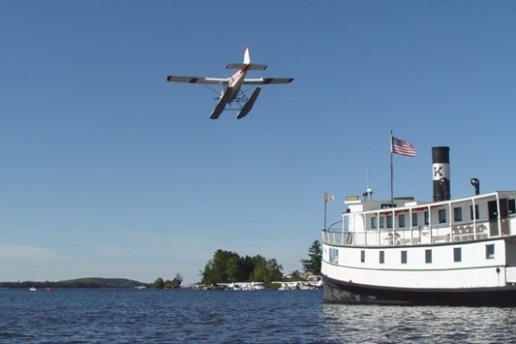 a plane flying over a large body of water